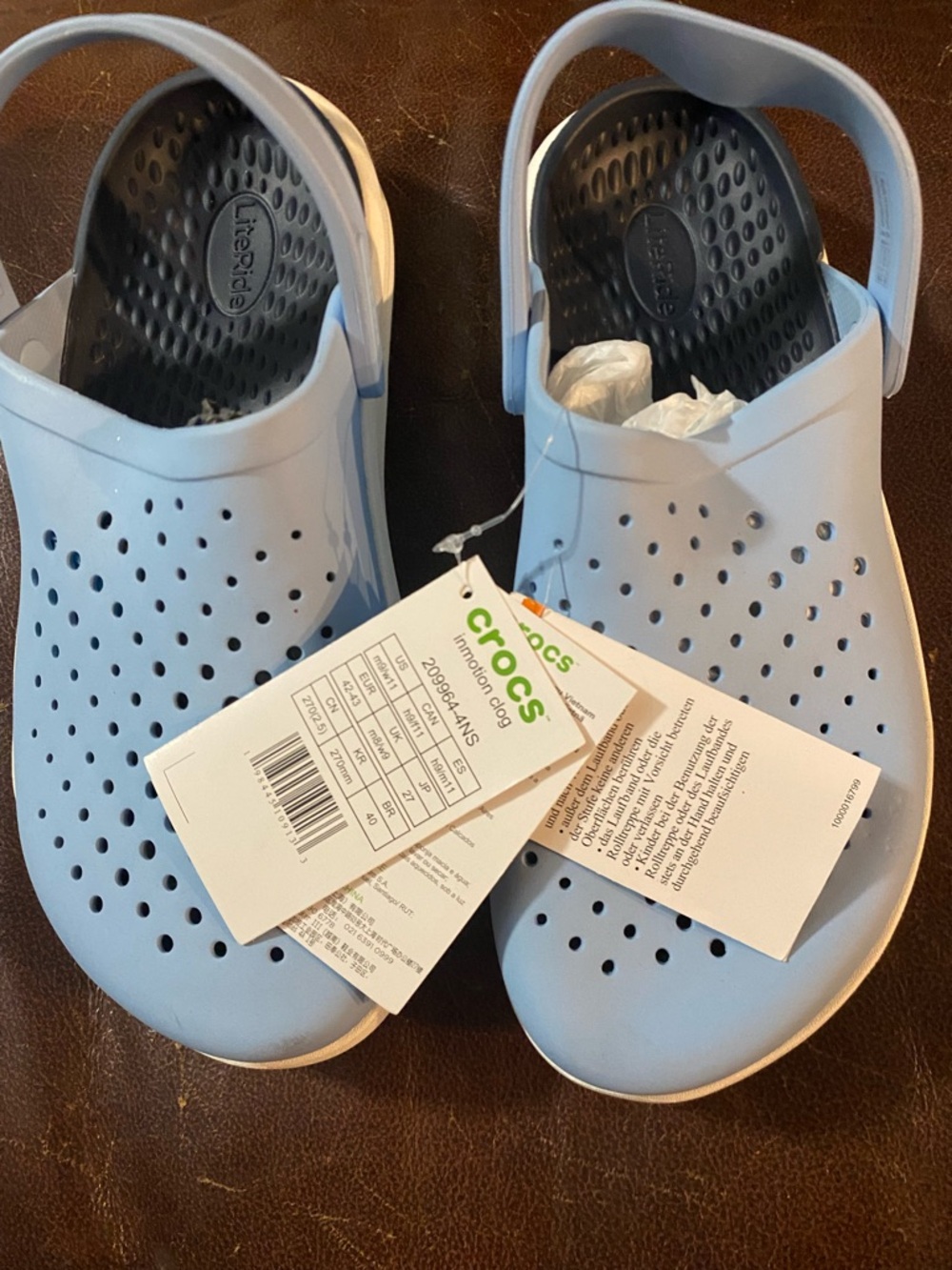 Crocs  LiteRide Clogs in Light Blue